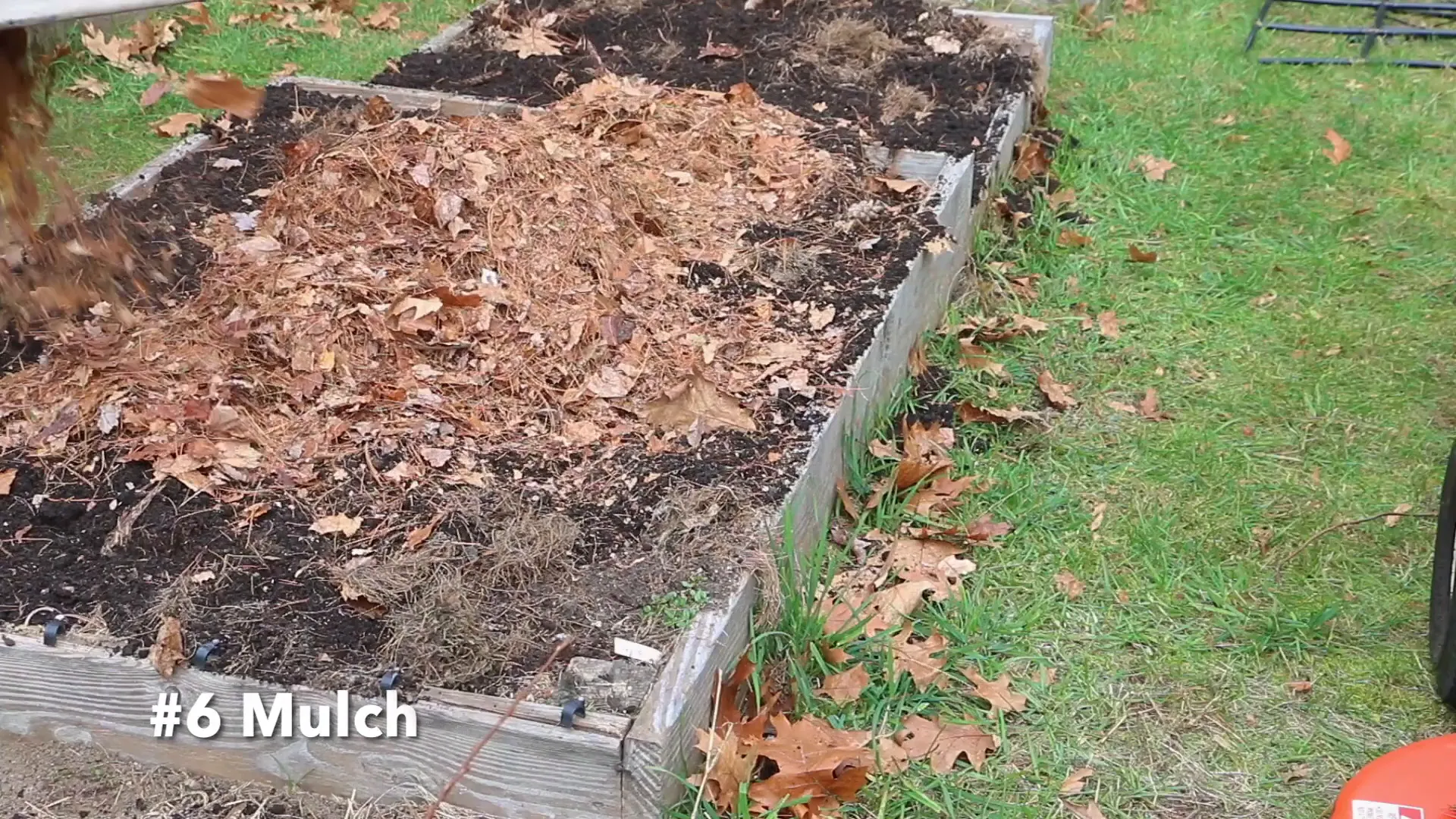 Applying mulch in the winter garden